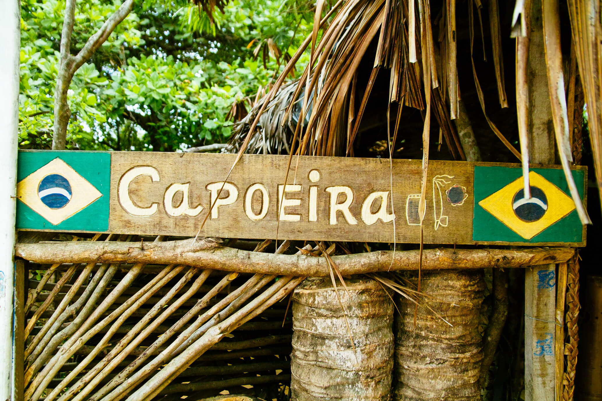 Capoeira sign with brazil flag wooden hut